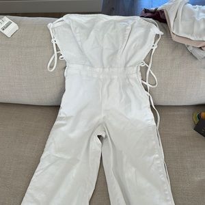 Good American never worn white denim romper gorgeous tie back and fun flare legs